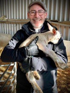 Fr Murray with Murray the lamb